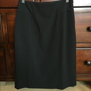 White House Black Market  black skirt. Size 4.